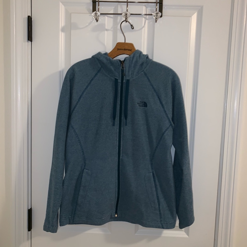 The North Face teal hoodie.